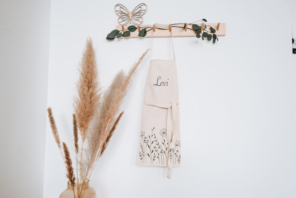 Kinderschürze personalisiert mit Namen und stilisierten Blumen - Jellies Design