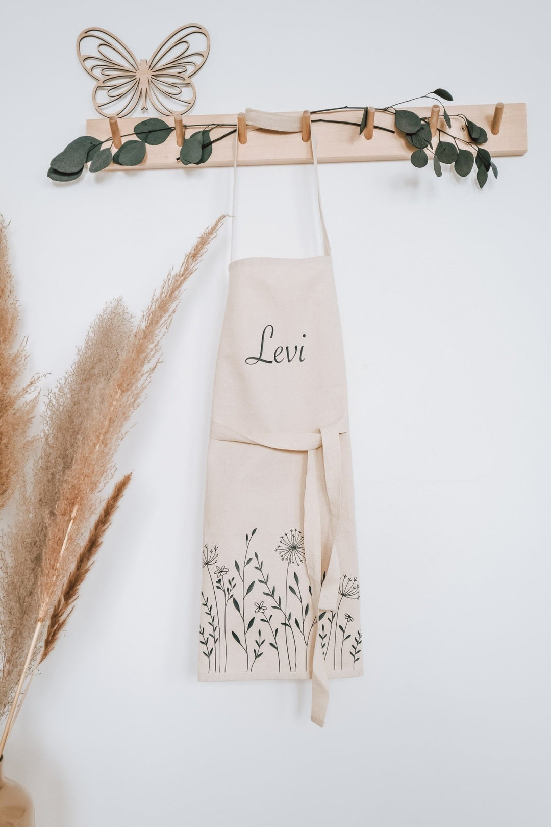 Kinderschürze personalisiert mit Namen und stilisierten Blumen - Jellies Design