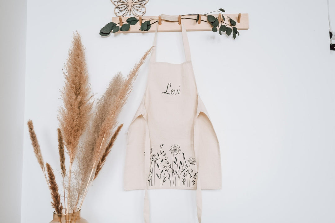 Kinderschürze personalisiert mit Namen und stilisierten Blumen - Jellies Design